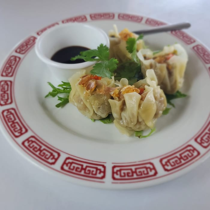 A3. Steamed Pork Dumplings.